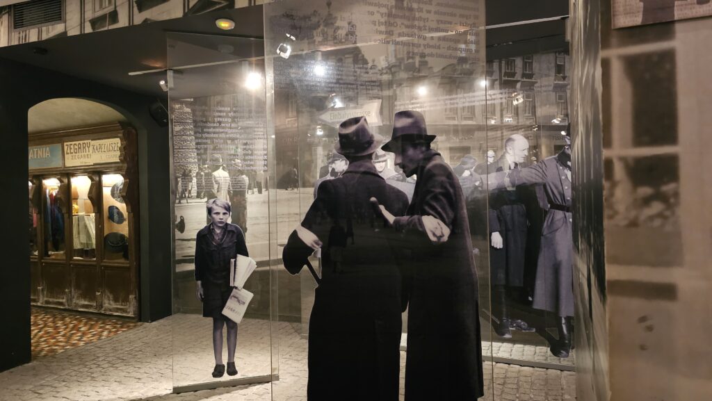 Fragment exhibition scene “Kraków Street” at the Schindler Factory Museum – reconstruction of everyday life in occupied Kraków. Schindler factory exhibition