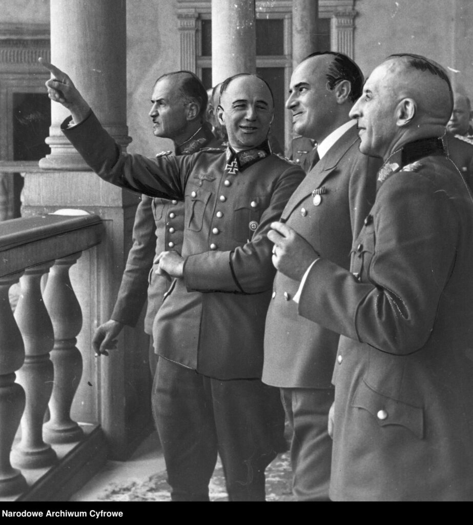 Governor Hans Frank with generals Walther von Brauchitsch and Johannes Blaskowitz on the arcades of Wawel Castle in Kraków, 1939–1944 (public domain, National Digital Archives)